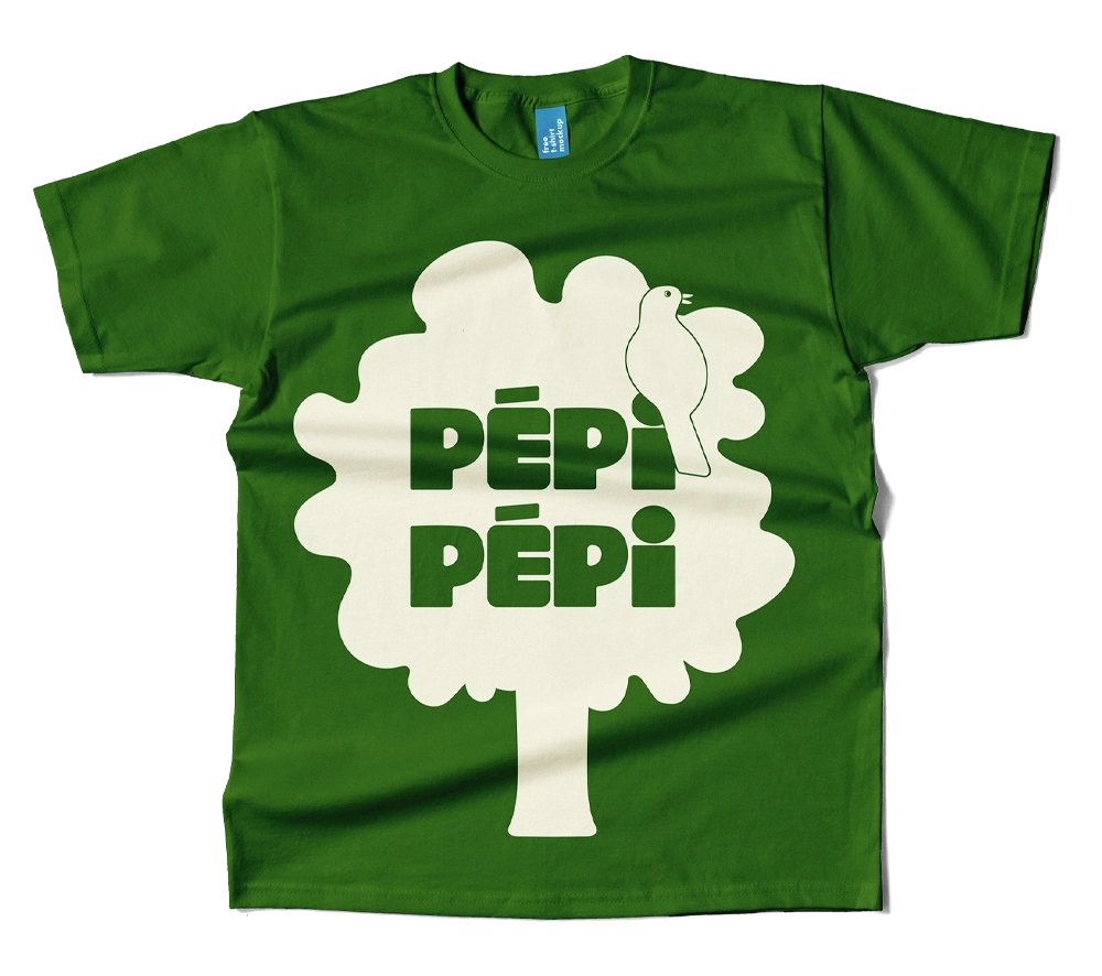 Green t-shirt with a white tree graphic, text 'PÉPI PÉPI,' and a bird perched on the tree.